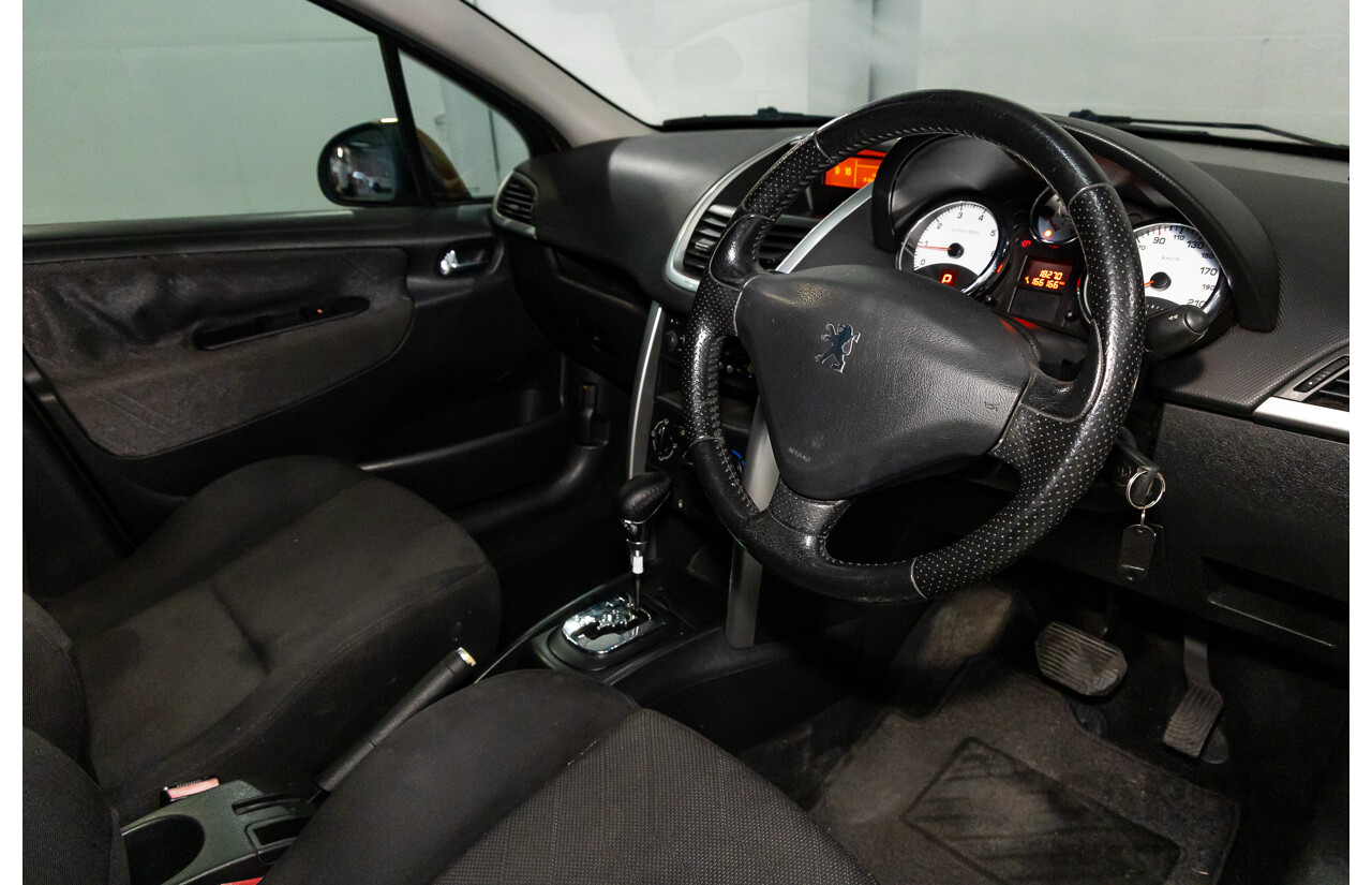 2/2009 Peugeot 207 XT  5d Hatchback Orange Salamanque Metallic 1.6L