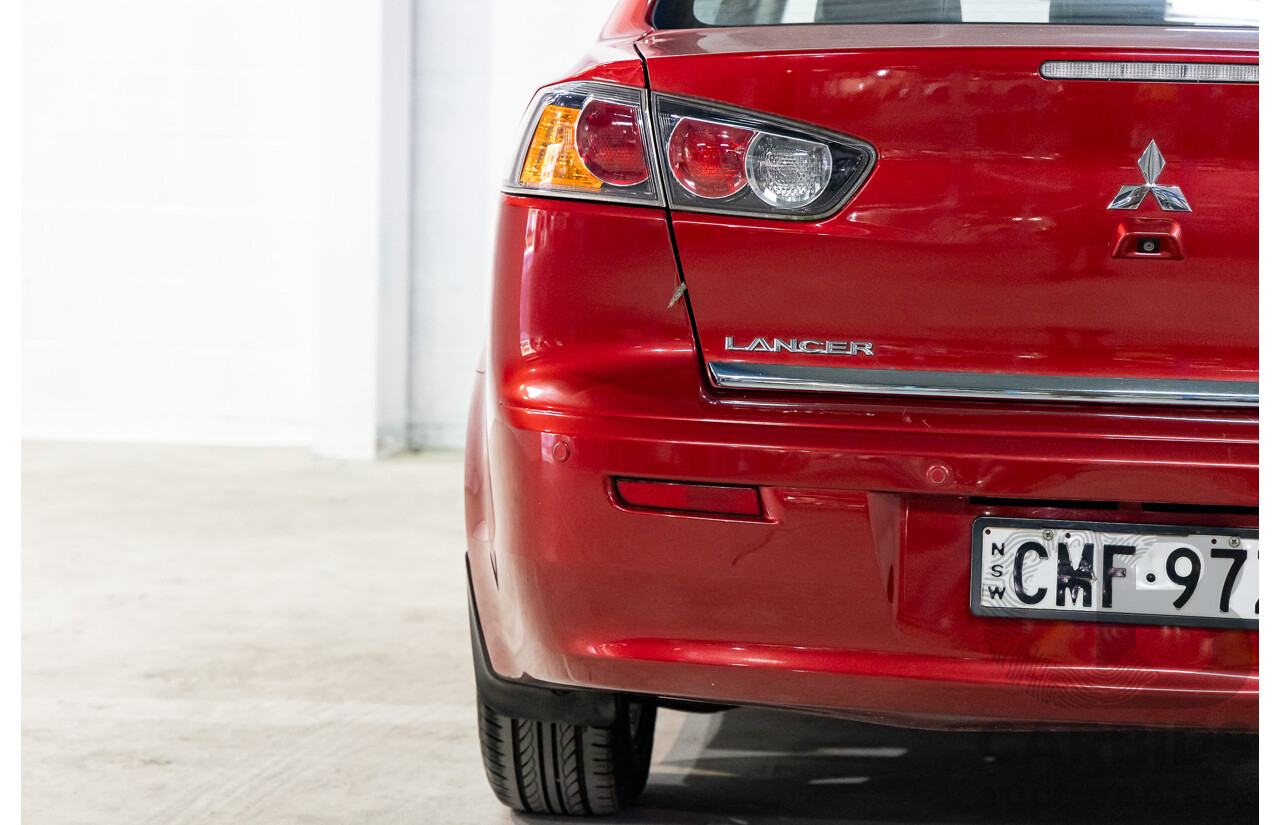1/2013 Mitsubishi Lancer LX CJ MY13 4d Sedan Red Metallic 2.0L