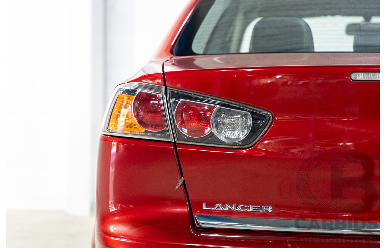 1/2013 Mitsubishi Lancer LX CJ MY13 4d Sedan Red Metallic 2.0L