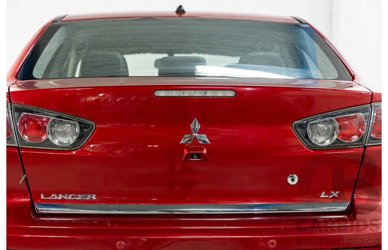 1/2013 Mitsubishi Lancer LX CJ MY13 4d Sedan Red Metallic 2.0L