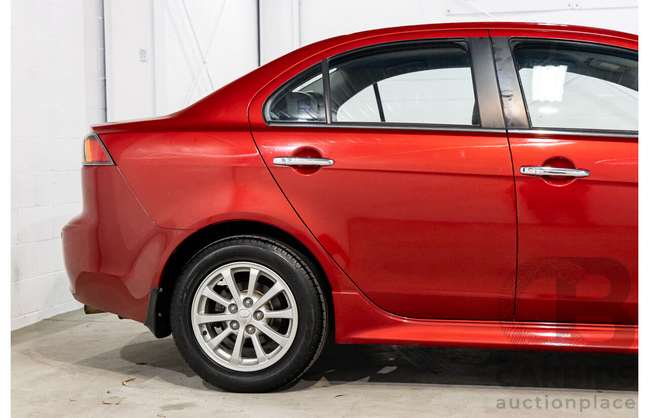 1/2013 Mitsubishi Lancer LX CJ MY13 4d Sedan Red Metallic 2.0L