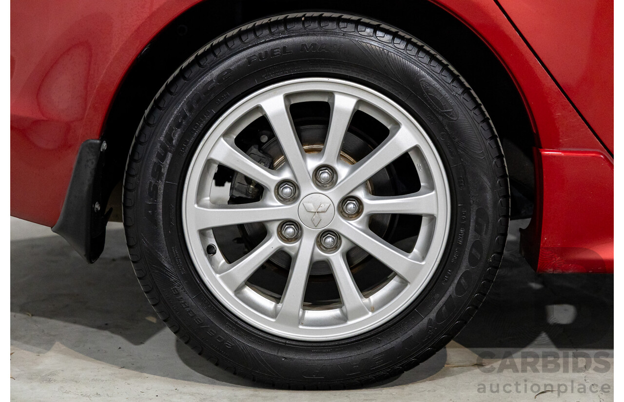 1/2013 Mitsubishi Lancer LX CJ MY13 4d Sedan Red Metallic 2.0L