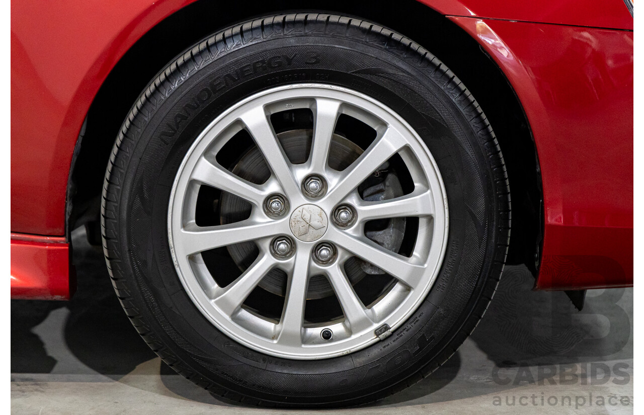 1/2013 Mitsubishi Lancer LX CJ MY13 4d Sedan Red Metallic 2.0L