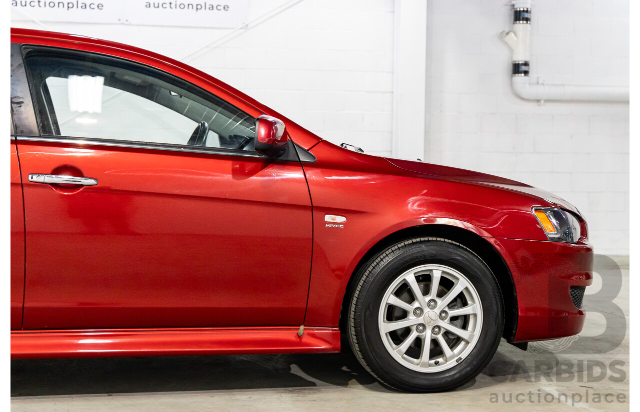 1/2013 Mitsubishi Lancer LX CJ MY13 4d Sedan Red Metallic 2.0L