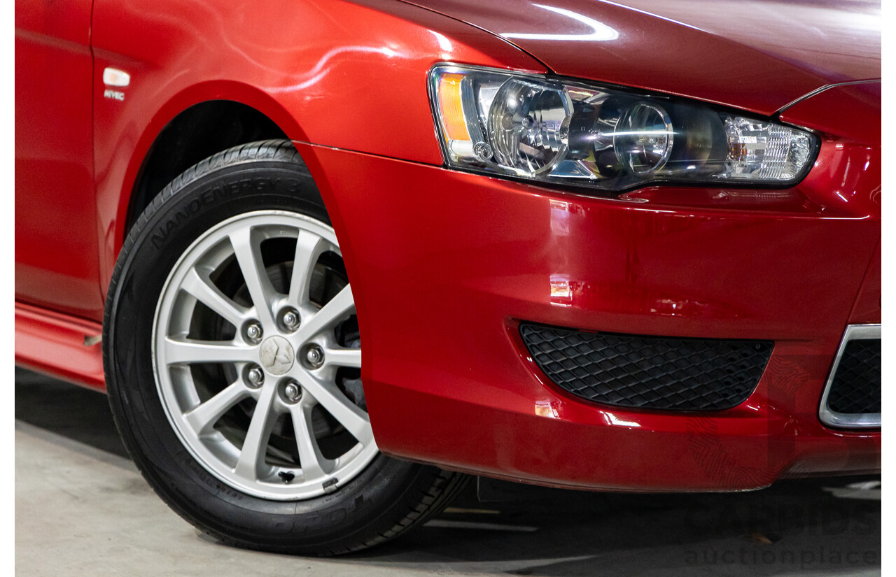 1/2013 Mitsubishi Lancer LX CJ MY13 4d Sedan Red Metallic 2.0L