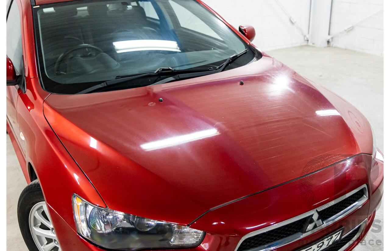 1/2013 Mitsubishi Lancer LX CJ MY13 4d Sedan Red Metallic 2.0L