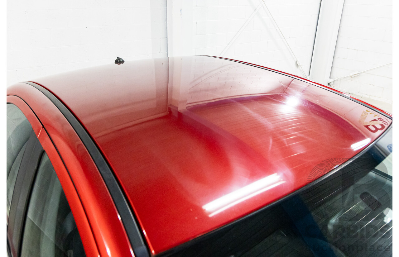 1/2013 Mitsubishi Lancer LX CJ MY13 4d Sedan Red Metallic 2.0L