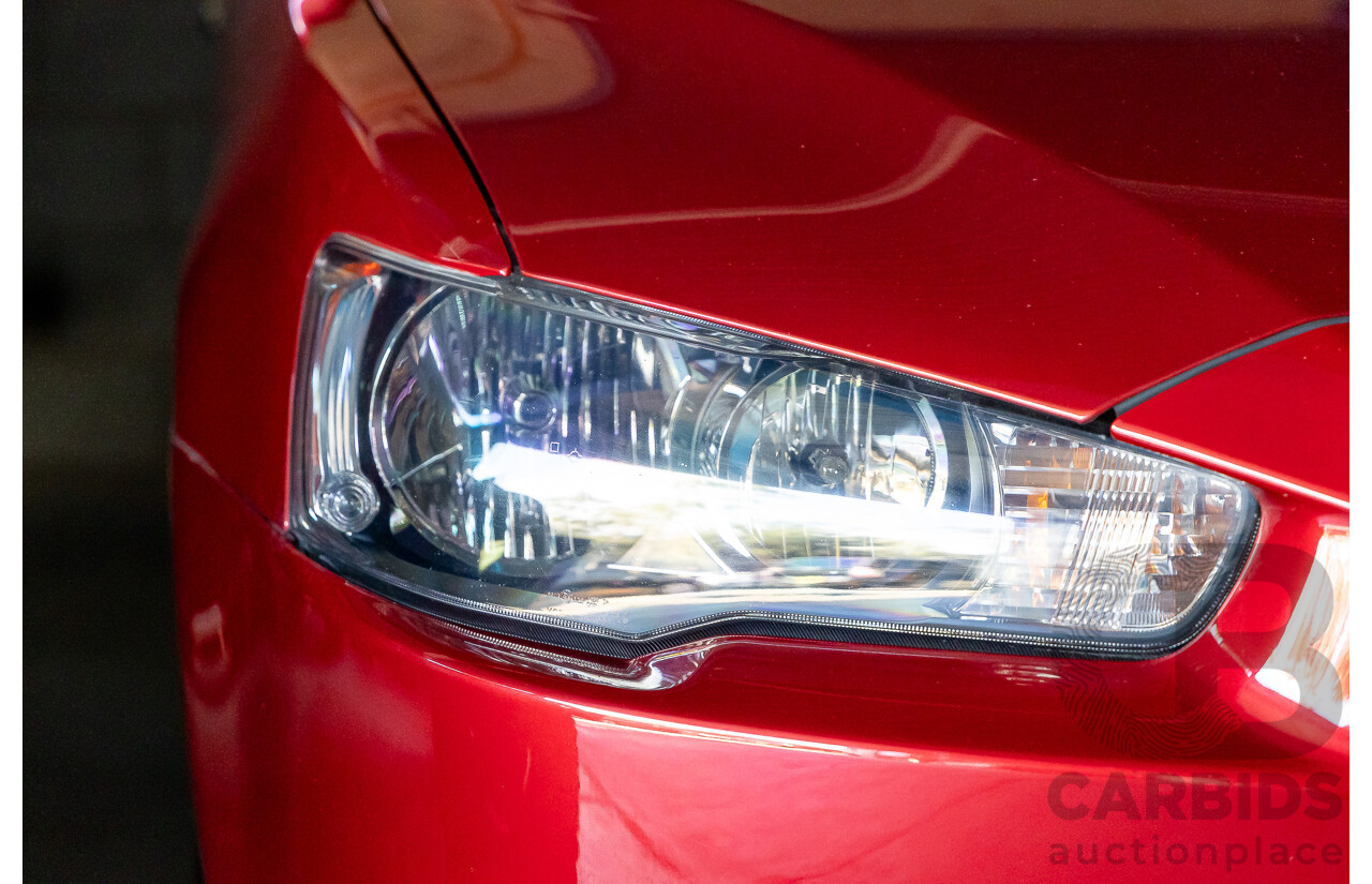 1/2013 Mitsubishi Lancer LX CJ MY13 4d Sedan Red Metallic 2.0L