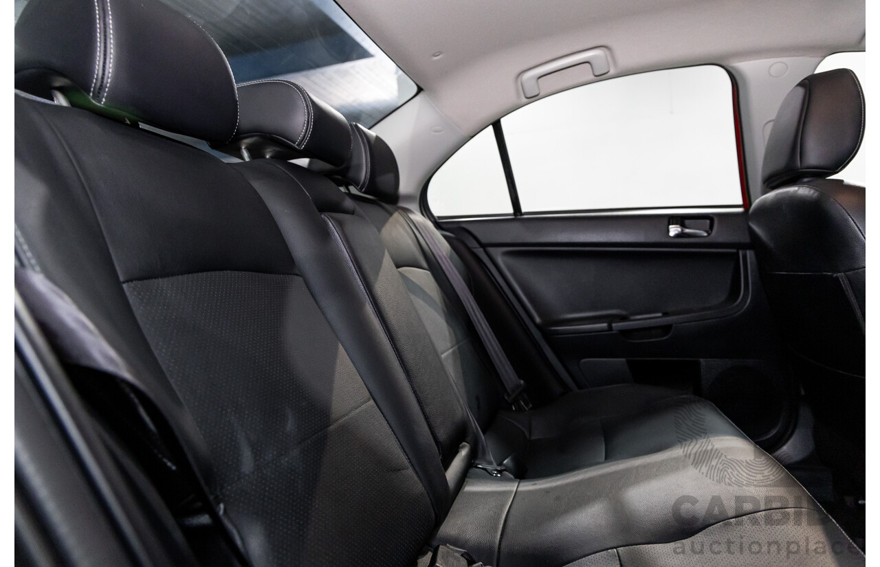 1/2013 Mitsubishi Lancer LX CJ MY13 4d Sedan Red Metallic 2.0L