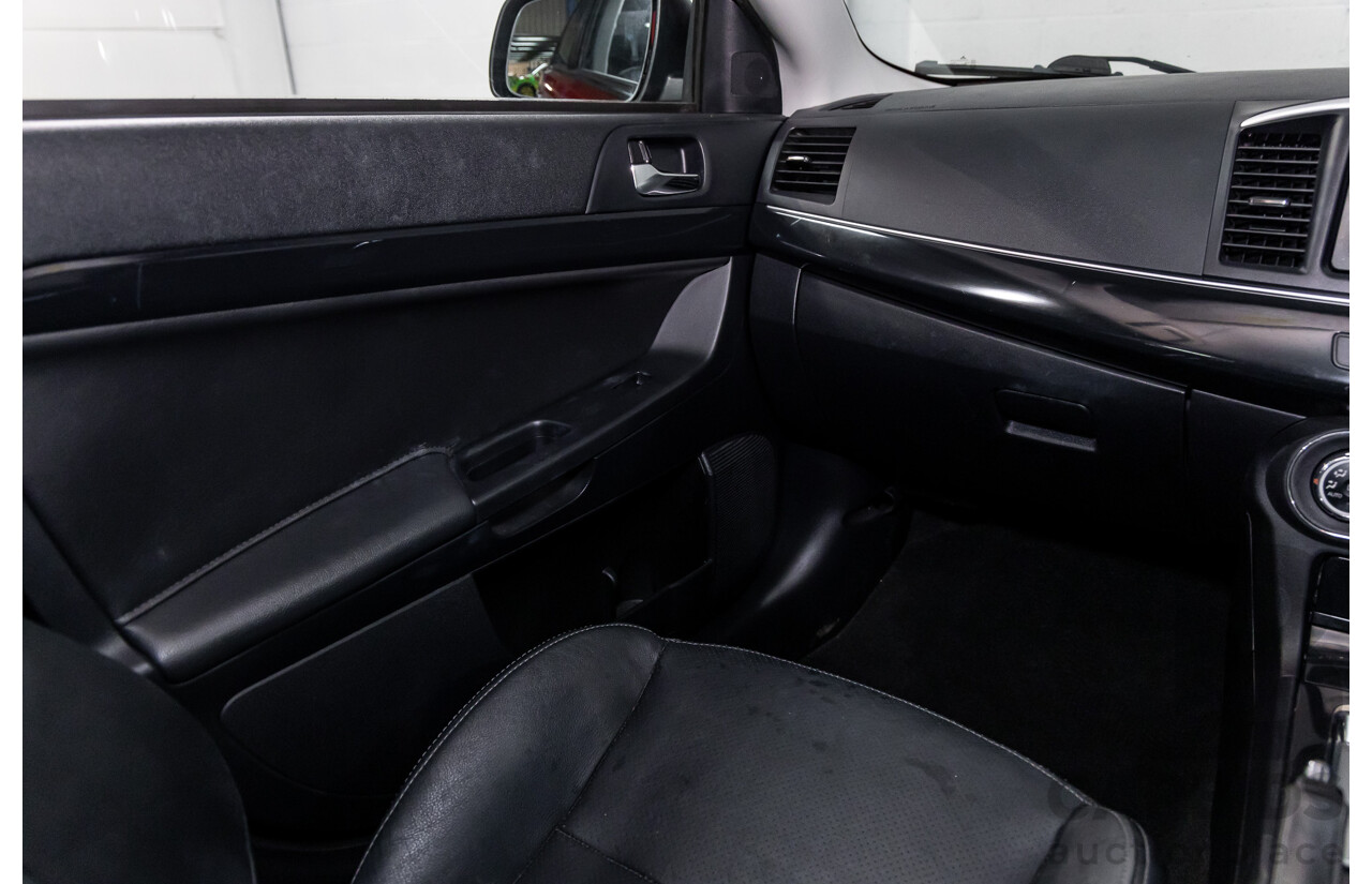 1/2013 Mitsubishi Lancer LX CJ MY13 4d Sedan Red Metallic 2.0L