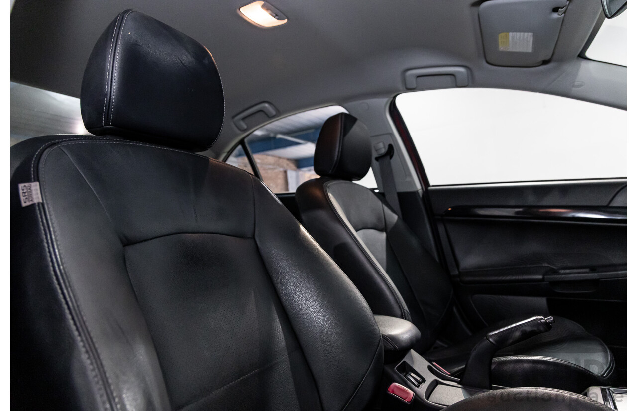 1/2013 Mitsubishi Lancer LX CJ MY13 4d Sedan Red Metallic 2.0L