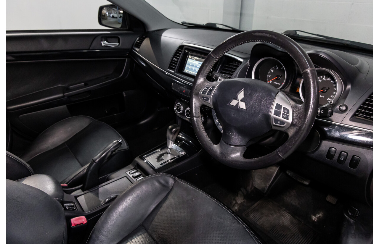 1/2013 Mitsubishi Lancer LX CJ MY13 4d Sedan Red Metallic 2.0L