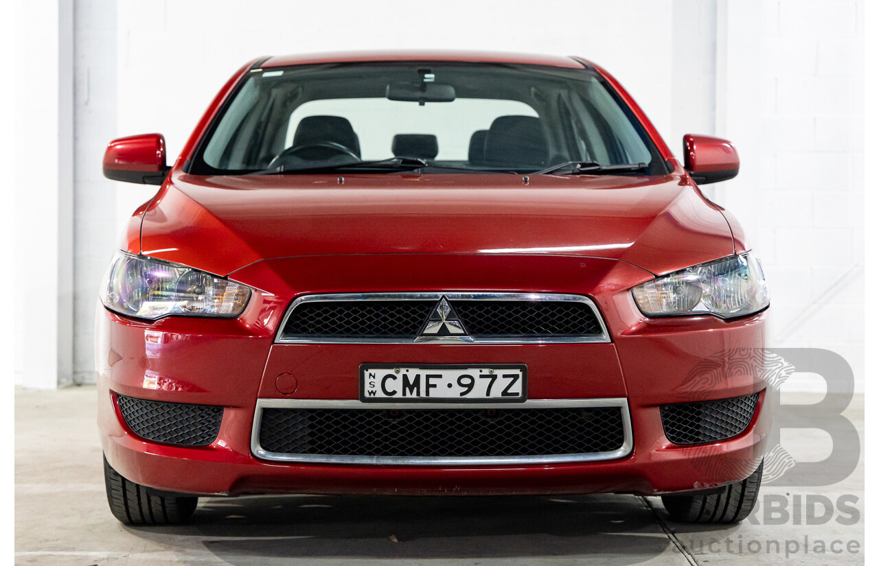 1/2013 Mitsubishi Lancer LX CJ MY13 4d Sedan Red Metallic 2.0L