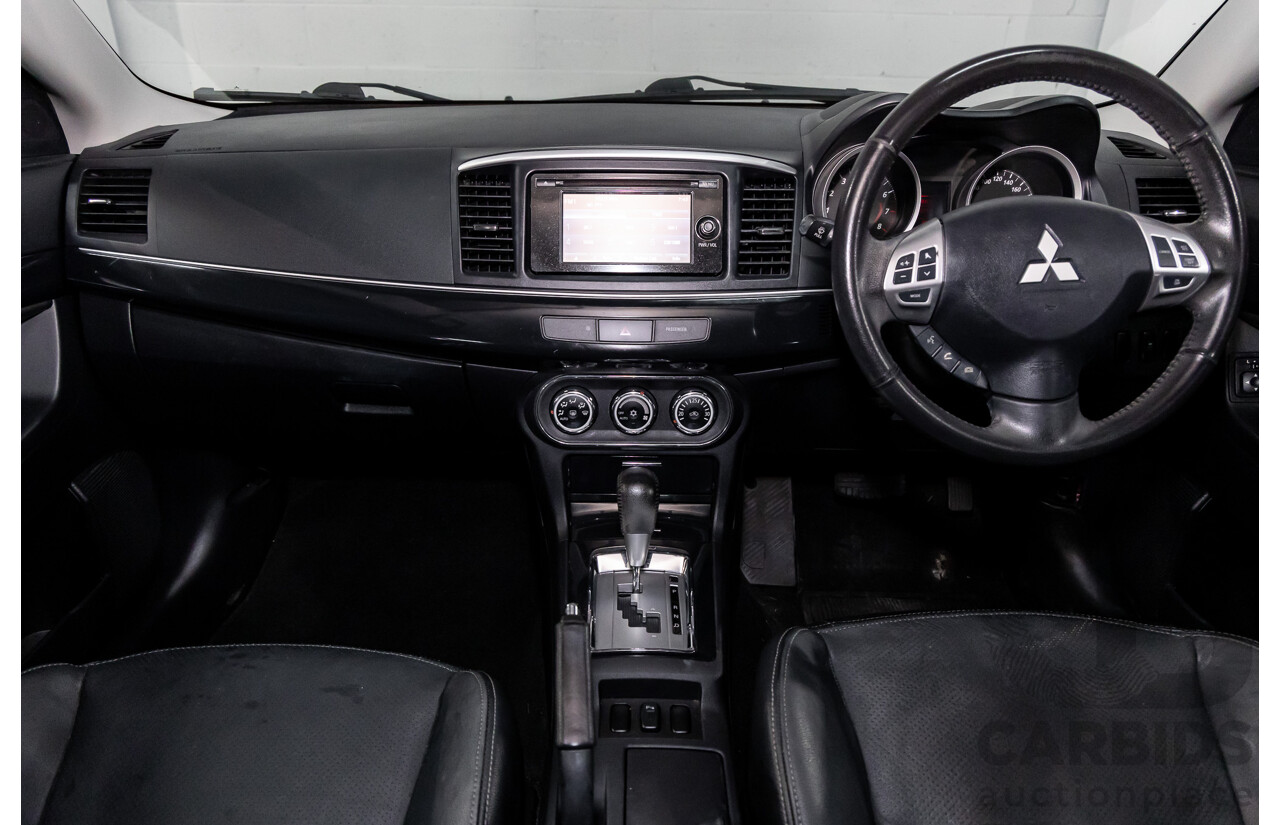 1/2013 Mitsubishi Lancer LX CJ MY13 4d Sedan Red Metallic 2.0L