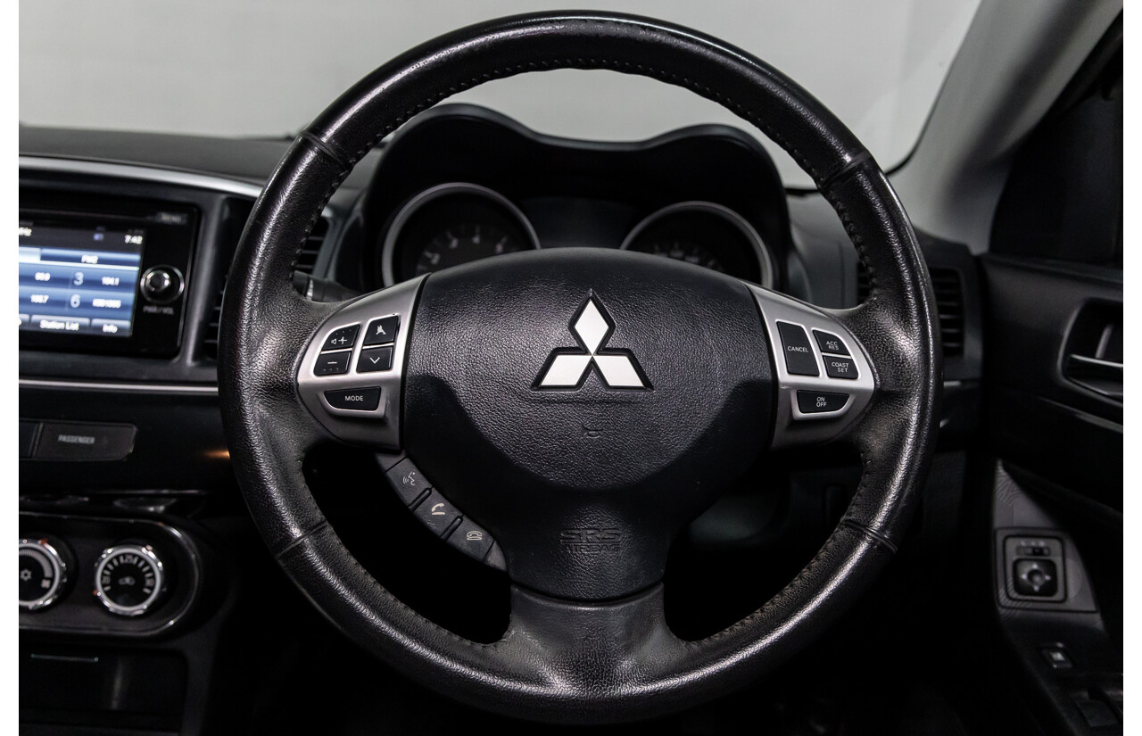 1/2013 Mitsubishi Lancer LX CJ MY13 4d Sedan Red Metallic 2.0L