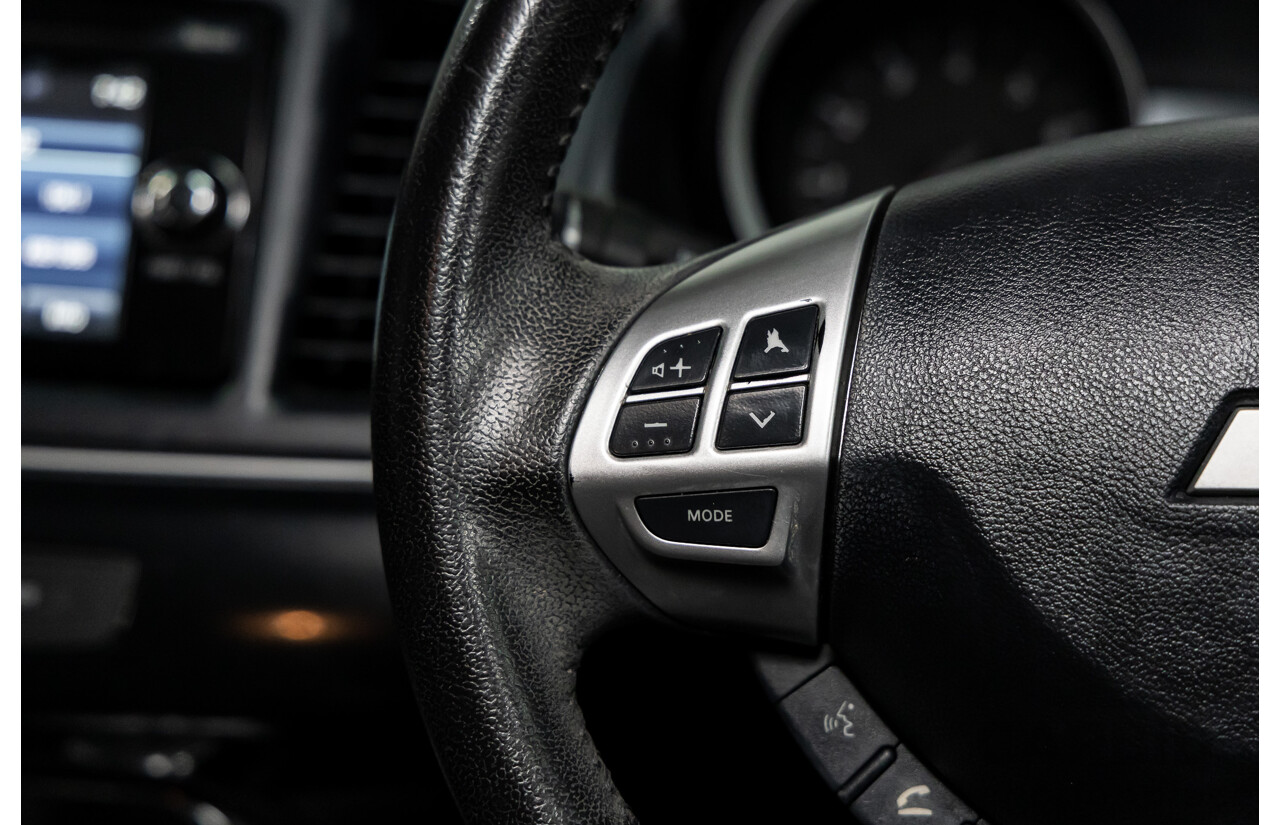 1/2013 Mitsubishi Lancer LX CJ MY13 4d Sedan Red Metallic 2.0L