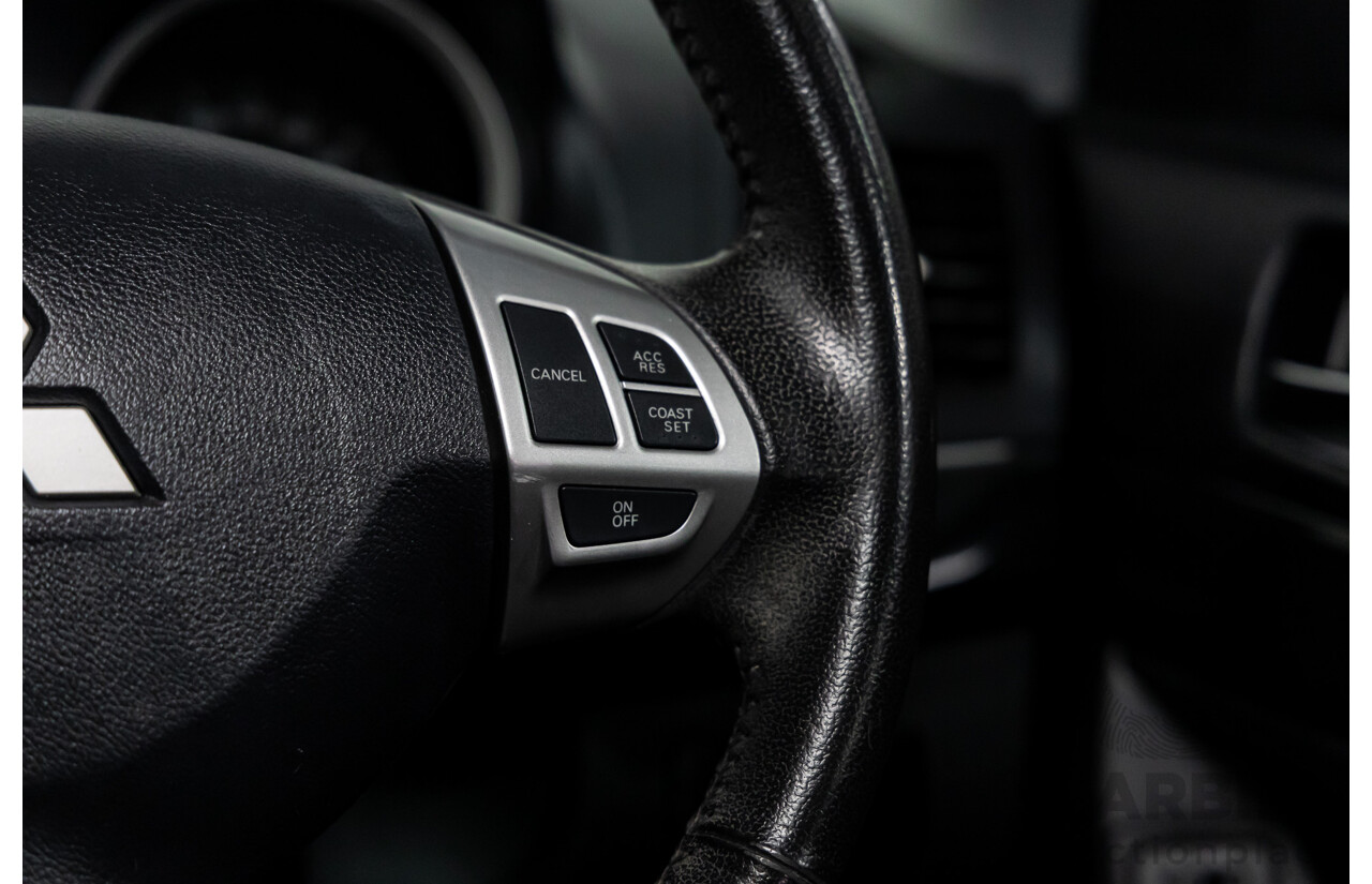 1/2013 Mitsubishi Lancer LX CJ MY13 4d Sedan Red Metallic 2.0L