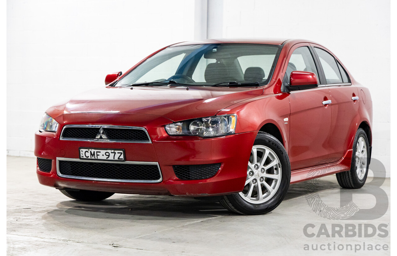 1/2013 Mitsubishi Lancer LX CJ MY13 4d Sedan Red Metallic 2.0L