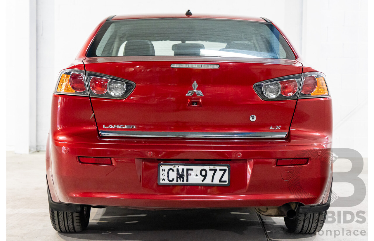 1/2013 Mitsubishi Lancer LX CJ MY13 4d Sedan Red Metallic 2.0L