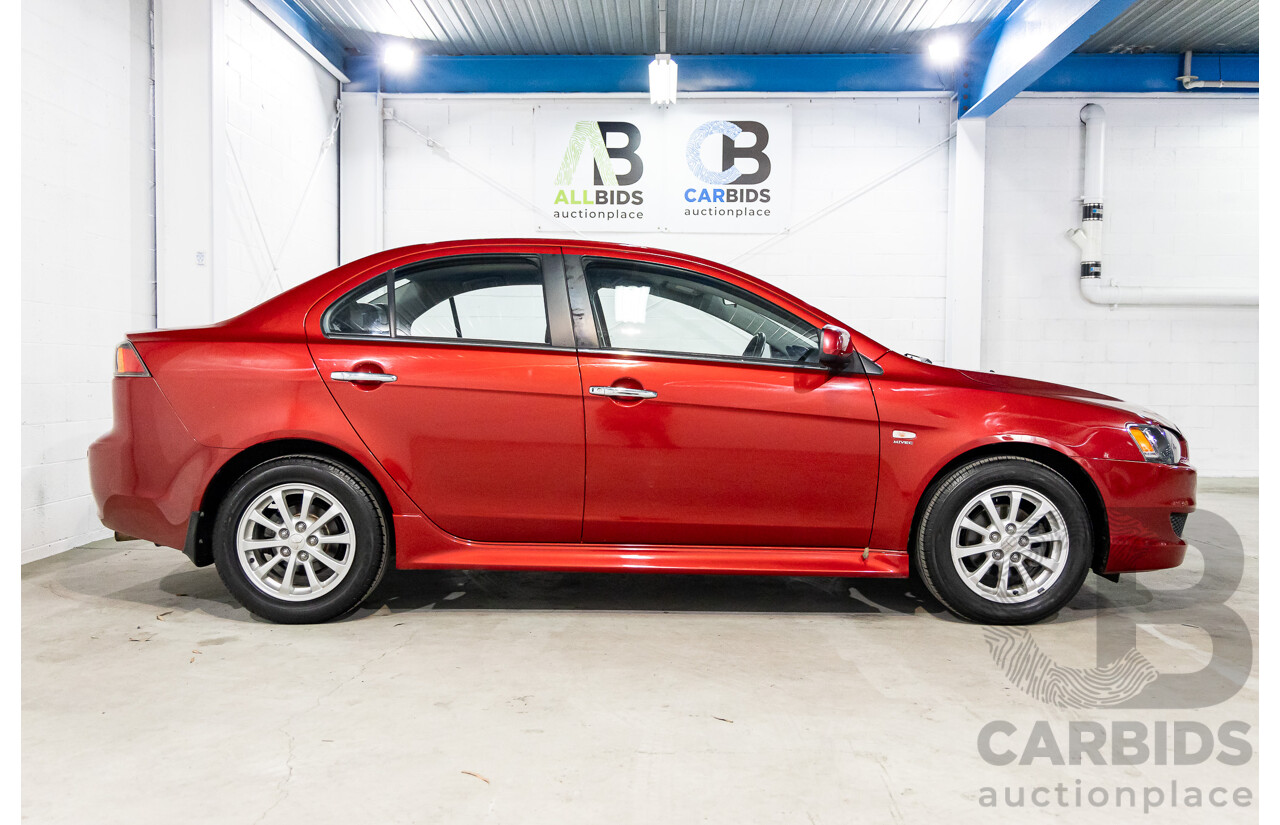 1/2013 Mitsubishi Lancer LX CJ MY13 4d Sedan Red Metallic 2.0L