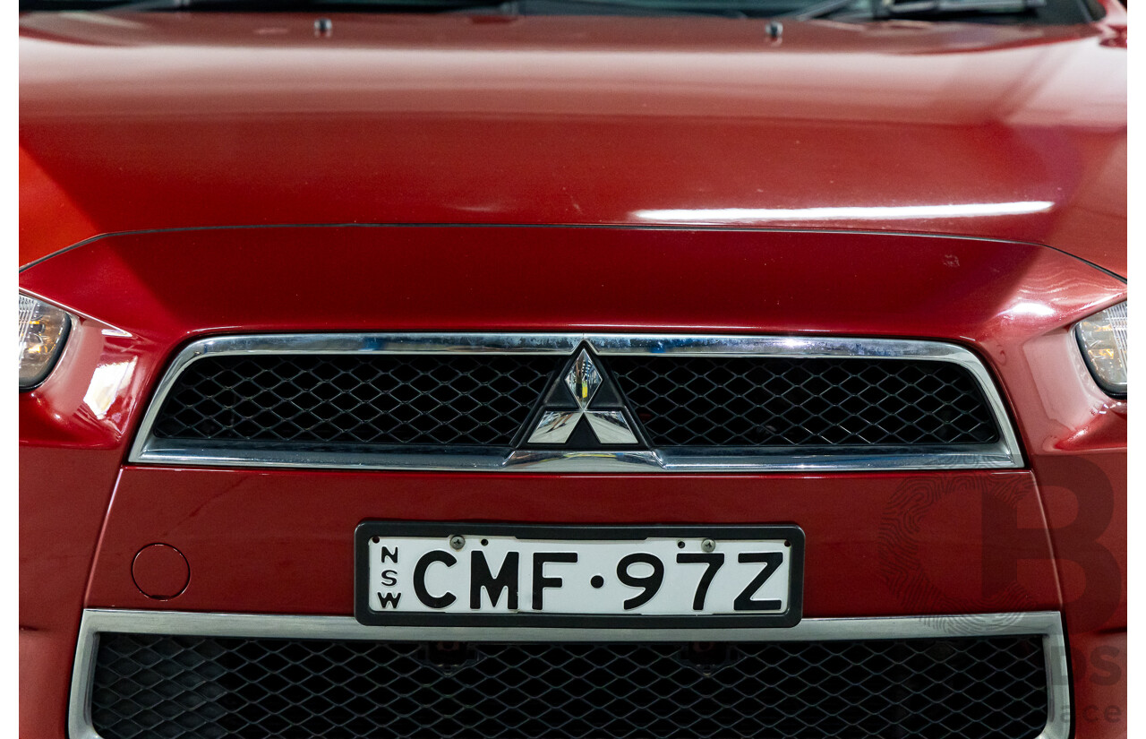 1/2013 Mitsubishi Lancer LX CJ MY13 4d Sedan Red Metallic 2.0L