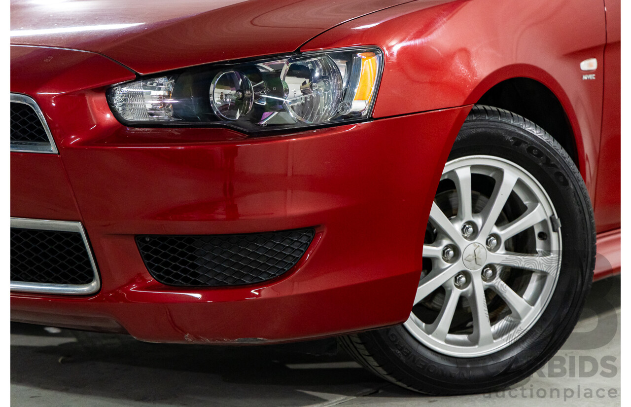 1/2013 Mitsubishi Lancer LX CJ MY13 4d Sedan Red Metallic 2.0L