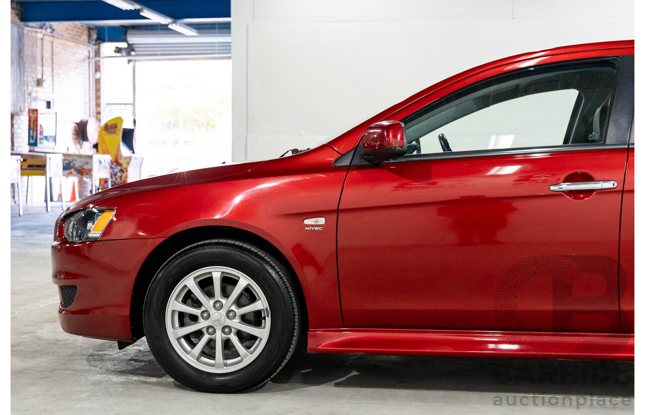 1/2013 Mitsubishi Lancer LX CJ MY13 4d Sedan Red Metallic 2.0L
