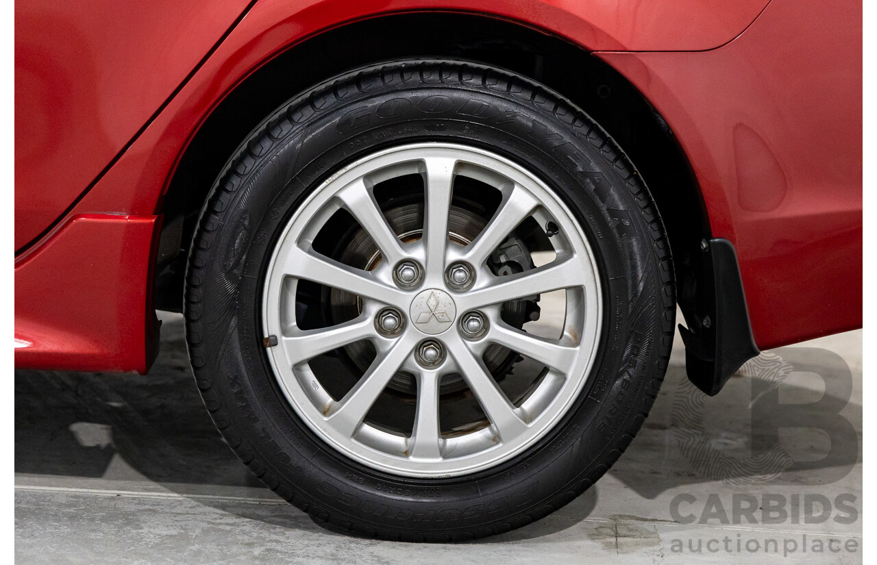 1/2013 Mitsubishi Lancer LX CJ MY13 4d Sedan Red Metallic 2.0L