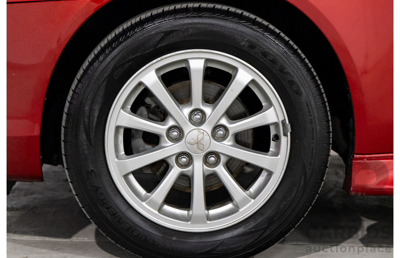 1/2013 Mitsubishi Lancer LX CJ MY13 4d Sedan Red Metallic 2.0L