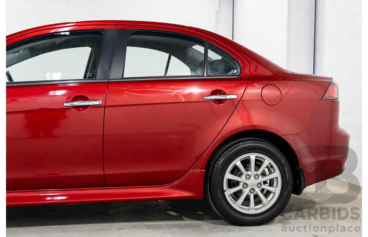 1/2013 Mitsubishi Lancer LX CJ MY13 4d Sedan Red Metallic 2.0L