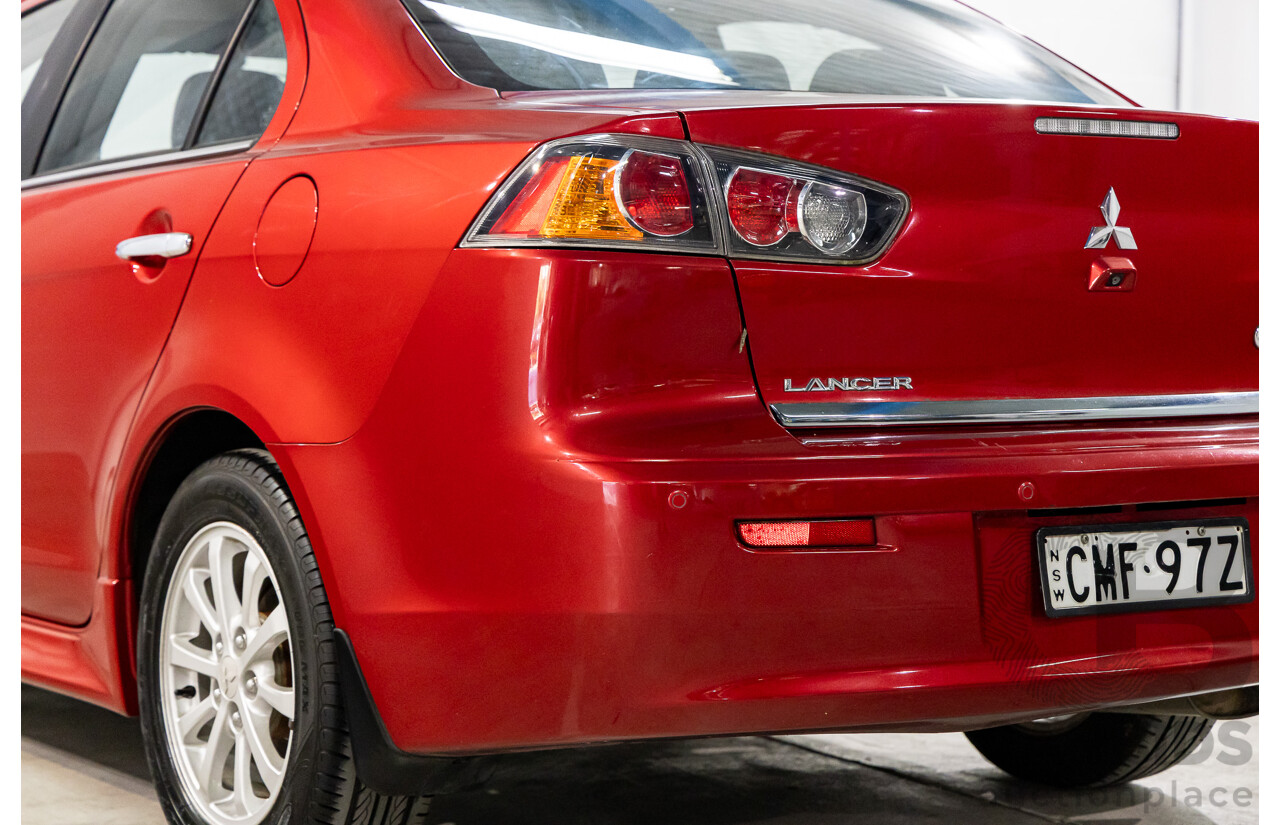 1/2013 Mitsubishi Lancer LX CJ MY13 4d Sedan Red Metallic 2.0L