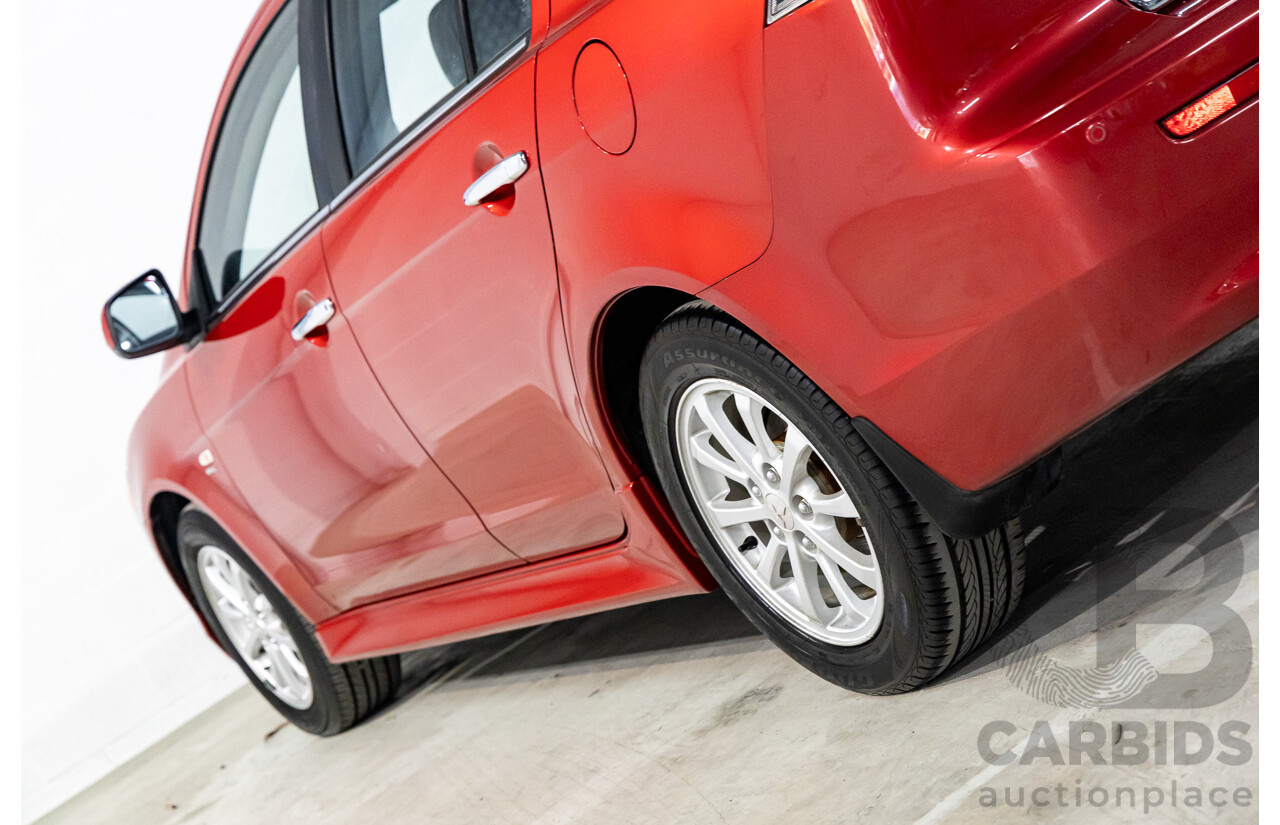 1/2013 Mitsubishi Lancer LX CJ MY13 4d Sedan Red Metallic 2.0L