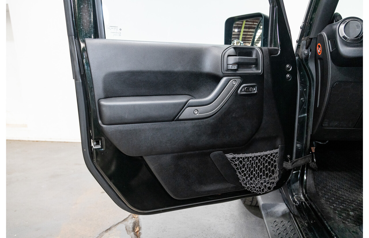 7/2012 Jeep Wrangler Unlimited Sport (4x4) JK MY13 4d Hardtop Dark Green 3.6L