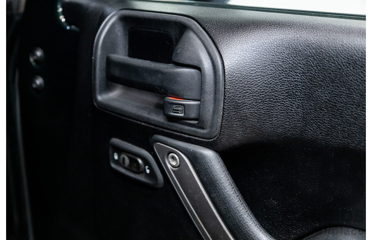 7/2012 Jeep Wrangler Unlimited Sport (4x4) JK MY13 4d Hardtop Dark Green 3.6L