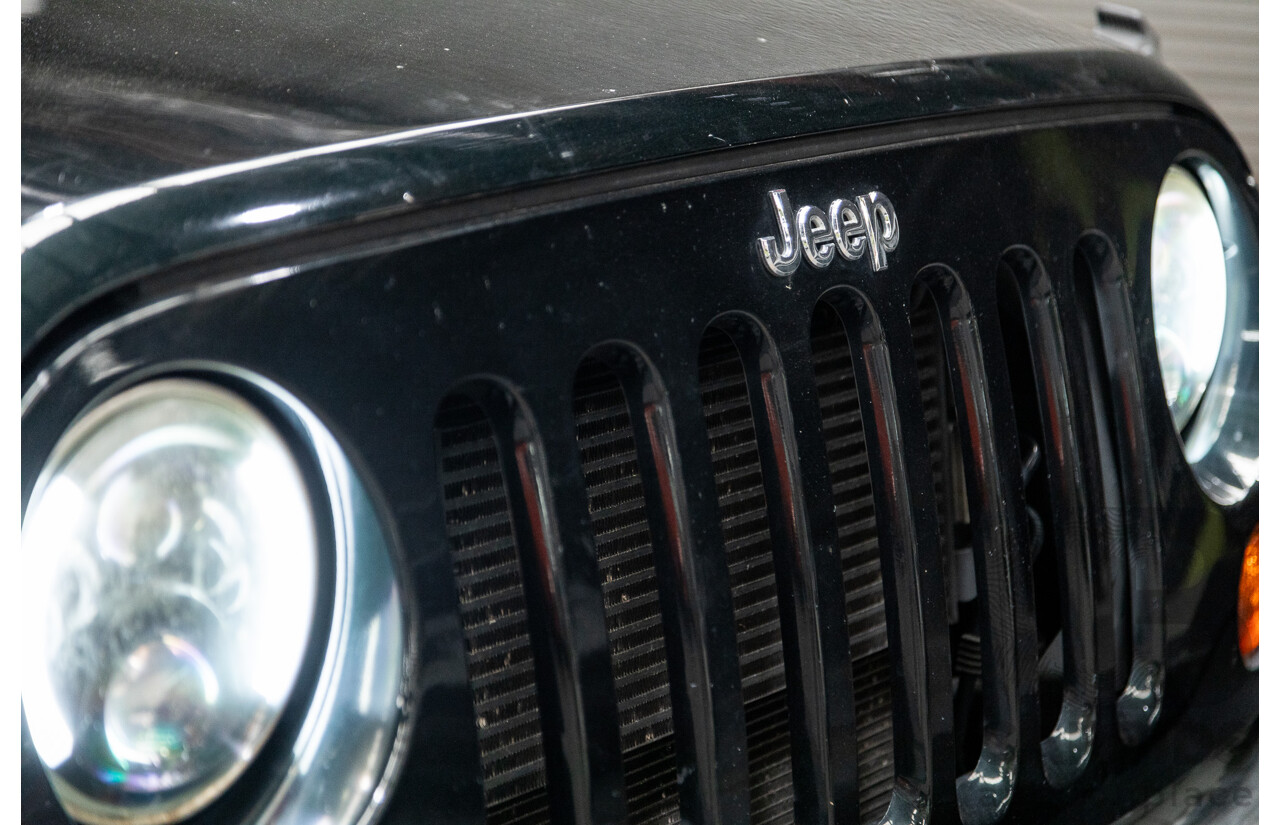 7/2012 Jeep Wrangler Unlimited Sport (4x4) JK MY13 4d Hardtop Dark Green 3.6L