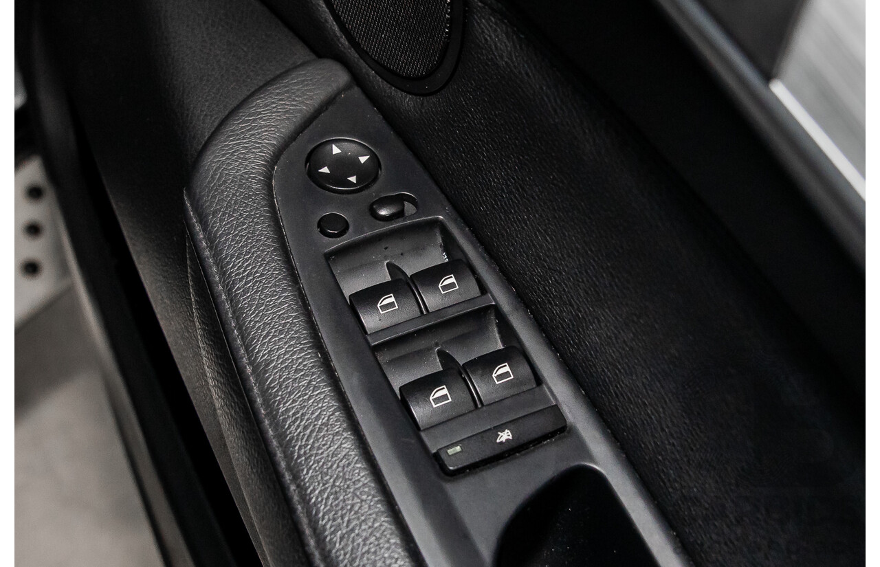 9/2011 BMW X5 Xdrive 40d Sport E70 MY10 4d Wagon Black Sapphire Metallic Twin Turbo Diesel 3.0L