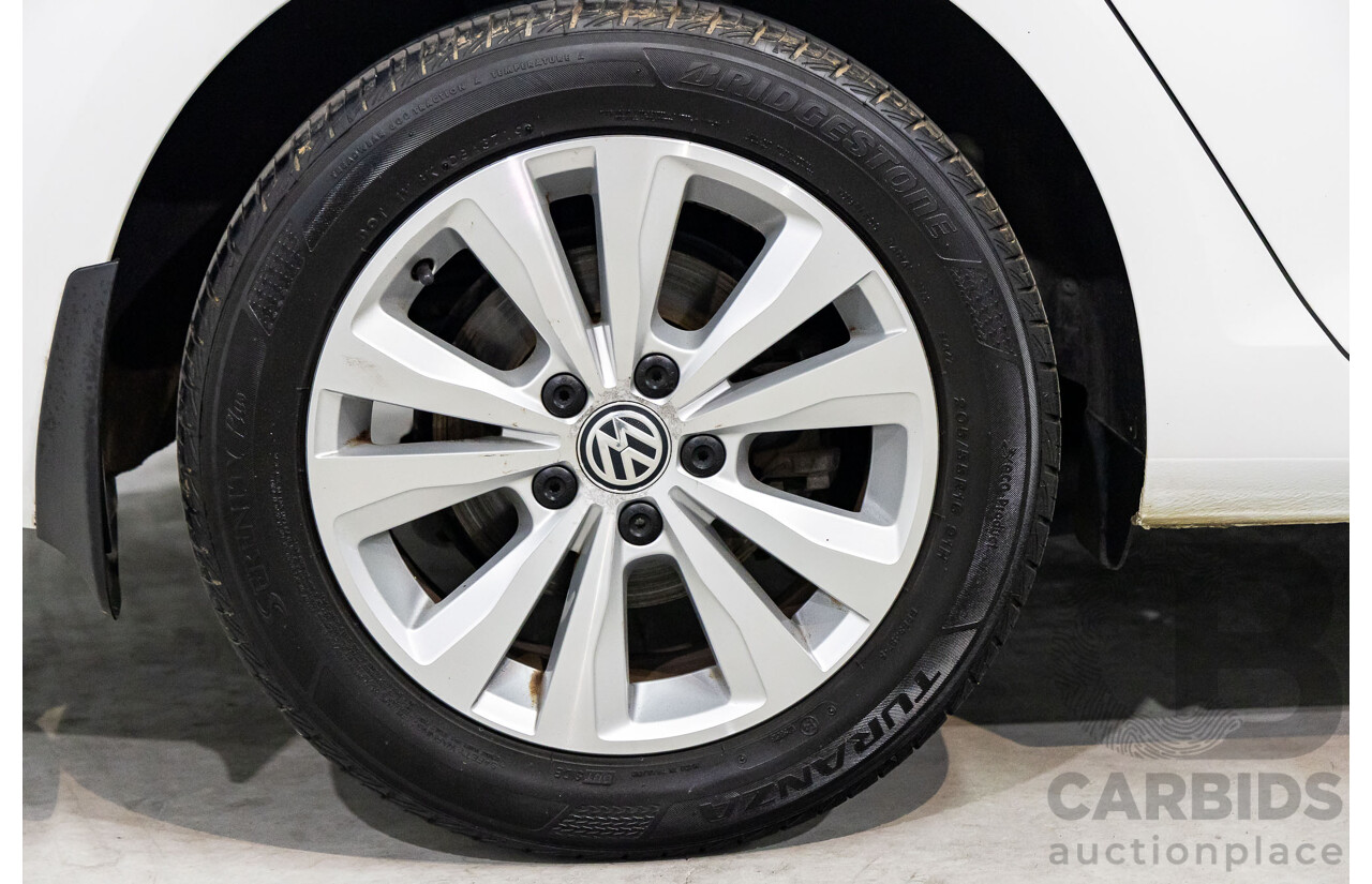 7/2014 Volkswagen Golf 90 TSI Comfortline AU MY14 4d Wagon Pure White Turbo 1.4L