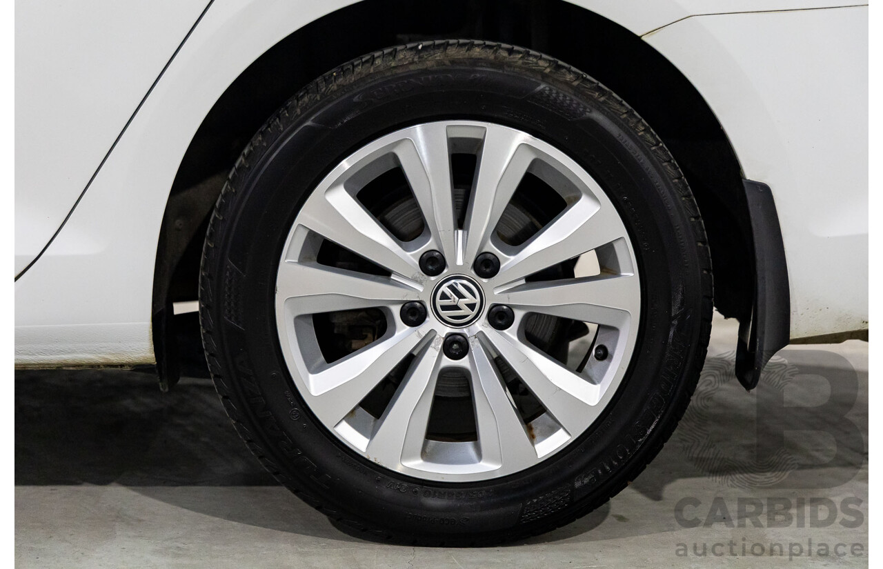7/2014 Volkswagen Golf 90 TSI Comfortline AU MY14 4d Wagon Pure White Turbo 1.4L