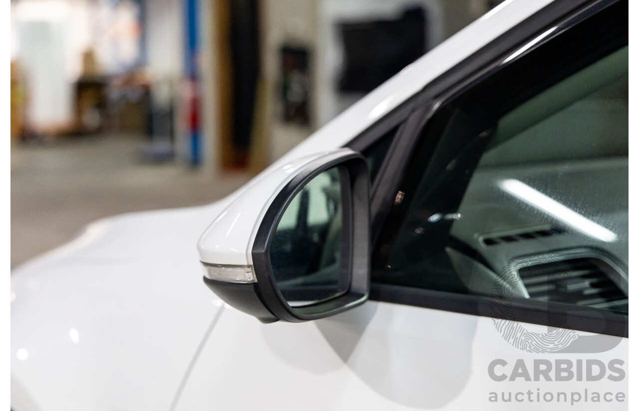 7/2014 Volkswagen Golf 90 TSI Comfortline AU MY14 4d Wagon Pure White Turbo 1.4L