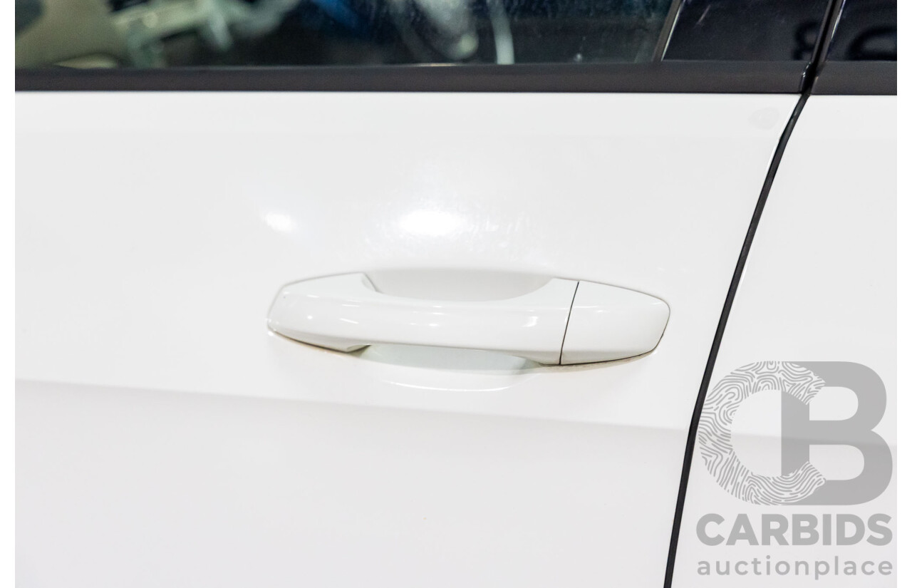 7/2014 Volkswagen Golf 90 TSI Comfortline AU MY14 4d Wagon Pure White Turbo 1.4L