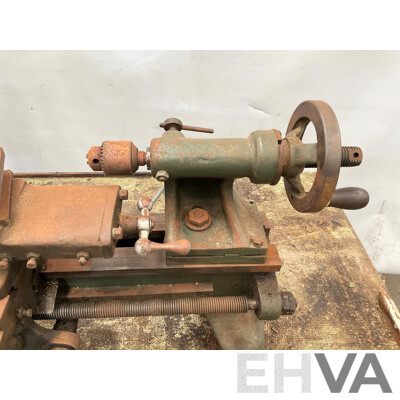 Antique Patrick Steel Lathe on Steel Bench with Various Cutting Tools, Chucks, Drill Bits and Micrometer