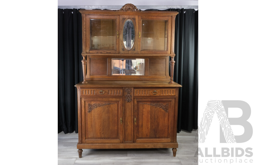 Vintage Oak Sideboard with Carvings, Beveled Glass, Mirrors and Turned Supports