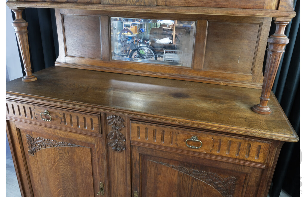 Vintage Oak Sideboard with Carvings, Beveled Glass, Mirrors and Turned Supports