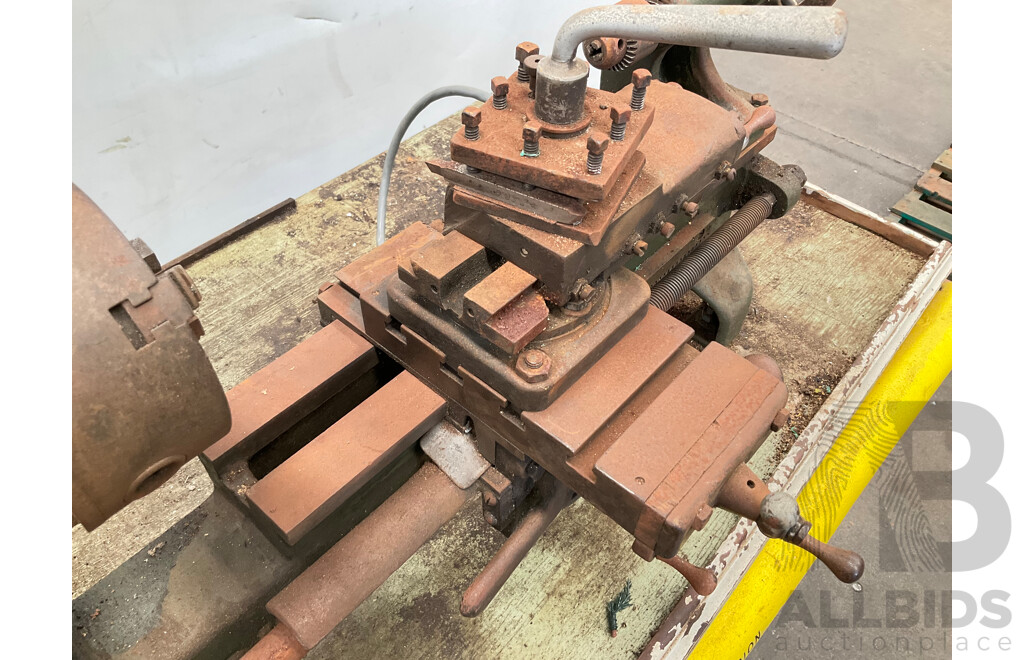 Antique Patrick Steel Lathe on Steel Bench with Various Cutting Tools, Chucks, Drill Bits and Micrometer
