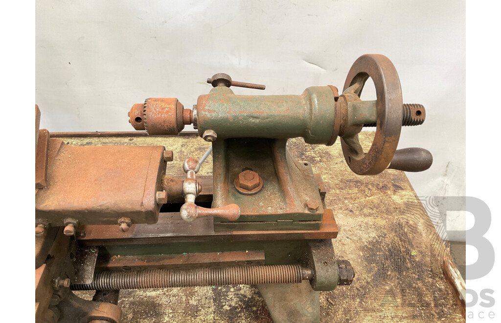Antique Patrick Steel Lathe on Steel Bench with Various Cutting Tools, Chucks, Drill Bits and Micrometer