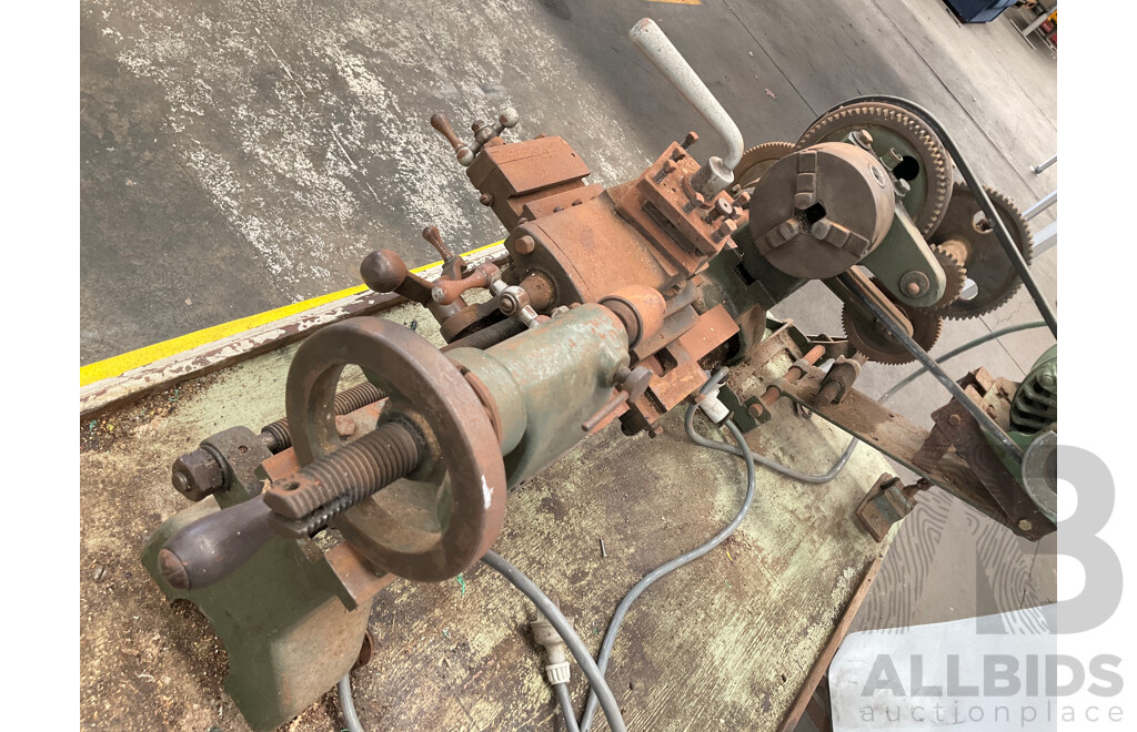 Antique Patrick Steel Lathe on Steel Bench with Various Cutting Tools, Chucks, Drill Bits and Micrometer