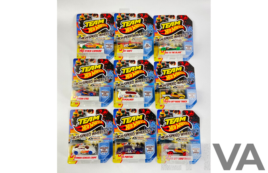 Nine Boxed Hot Wheels High Speed Wheels Including Stock Camaro, Sky Knife, Bad to the Blade, Nissan 370Z, Hyperliner, Toyota Off Road Truck, Hyundai Genesis Coupe, Pontiac