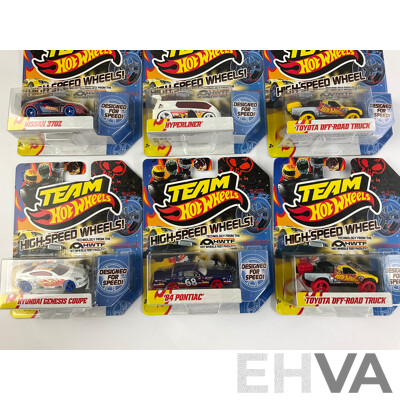Nine Boxed Hot Wheels High Speed Wheels Including Stock Camaro, Sky Knife, Bad to the Blade, Nissan 370Z, Hyperliner, Toyota Off Road Truck, Hyundai Genesis Coupe, Pontiac