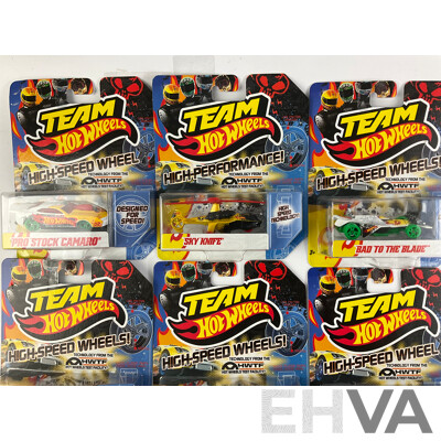 Nine Boxed Hot Wheels High Speed Wheels Including Stock Camaro, Sky Knife, Bad to the Blade, Nissan 370Z, Hyperliner, Toyota Off Road Truck, Hyundai Genesis Coupe, Pontiac