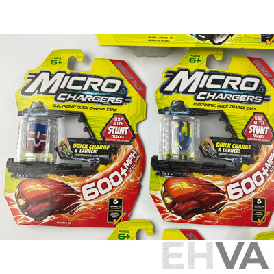 Twelve Boxed Micro Chargers Electronic Quick Charge Cars, Including Three Launcher Packs